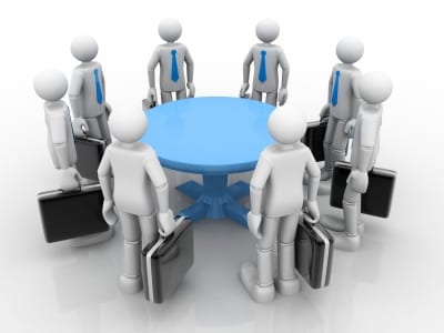 Negotiation at Table - Centurion 7 Business Advisors